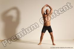 Underwear Gymnastic poses Man Black Muscular Bald Dancing Dynamic poses Academic